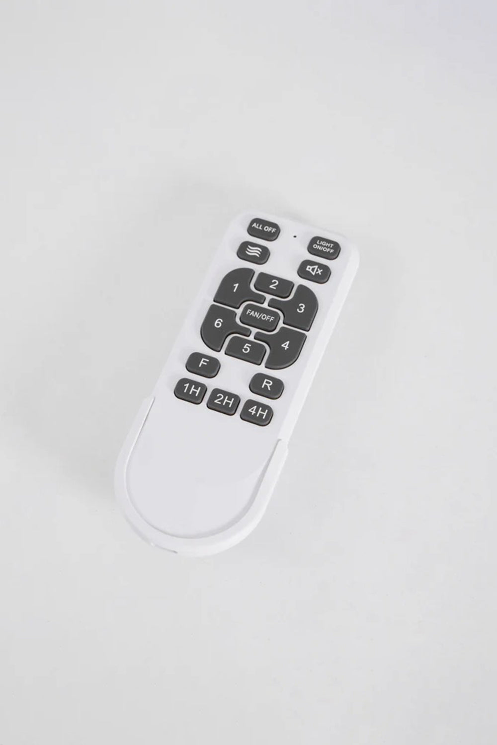 Heli Breeze Helicopter Ceiling Fan Light | Accessory | Clean close-up view of the minimalist white multi-button remote control accessory on a solid white surface | Samu Lamp