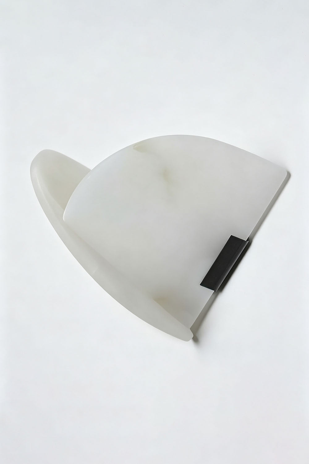 Hollis Angled Alabaster Wall Lamp | Natural Alabaster and Metal | Unlit product view on a plain white backdrop showing white stone texture | Samu Lamp