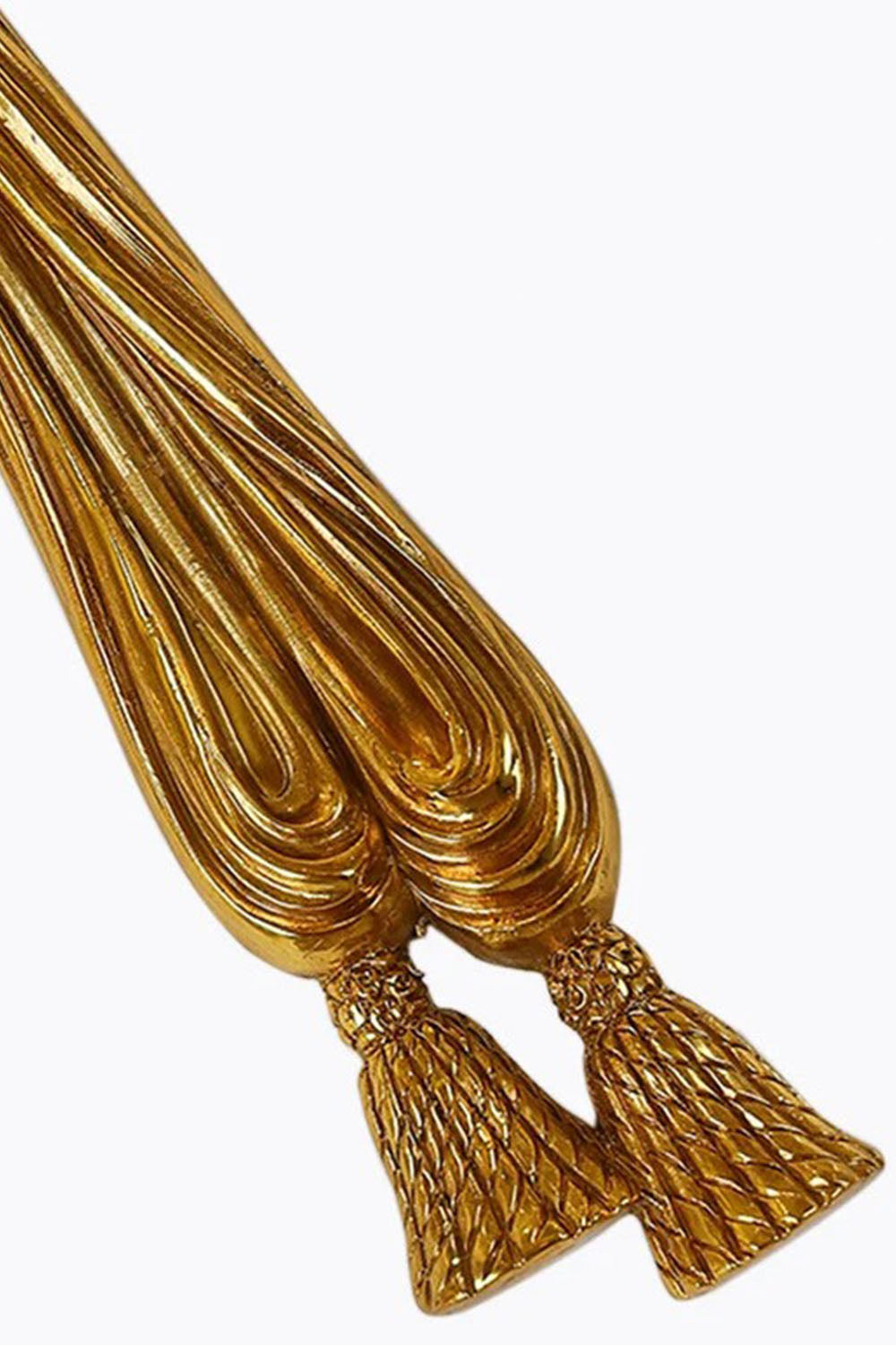 Honoria Rope and Tassel Brass Sconce | Brass and Metal | Macro detail of the elegant brass rope tassel design at the bottom | Samu Lamp