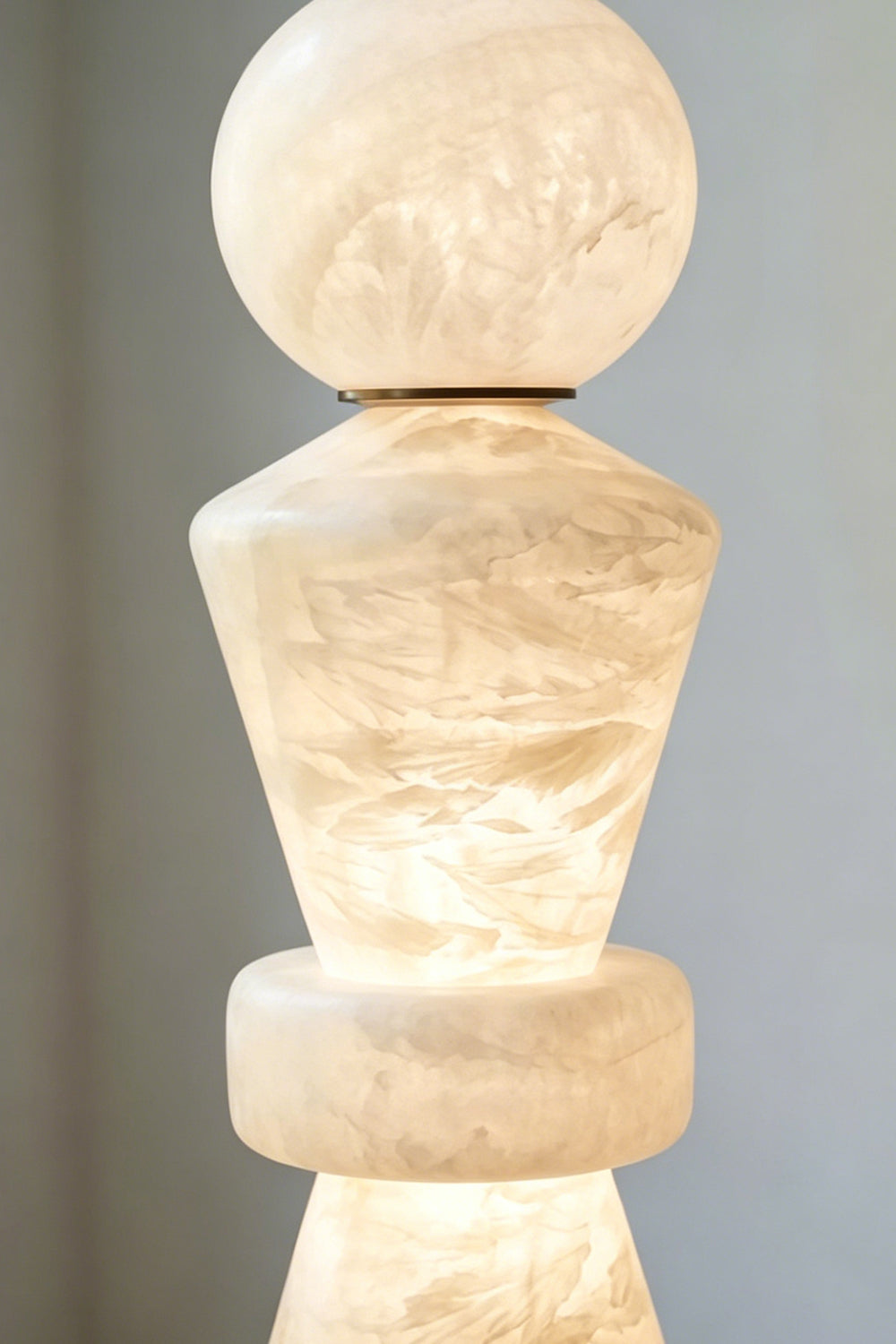 Lit Alabaster Top Detail | Alabaster | Close-up of illuminated top sphere and geometric segment | Samu Lamp