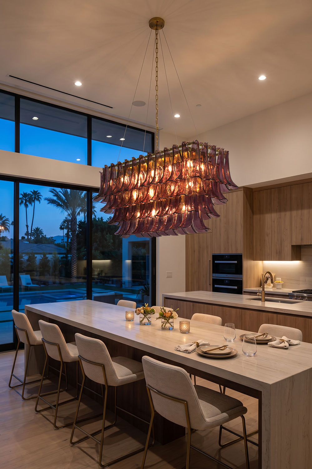 Ilvesse Amethyst Glass Petal Rectangular Chandelier | Amethyst Glass and Brass | Lighting a long kitchen island breakfast bar facing evening views | Samu Lamp