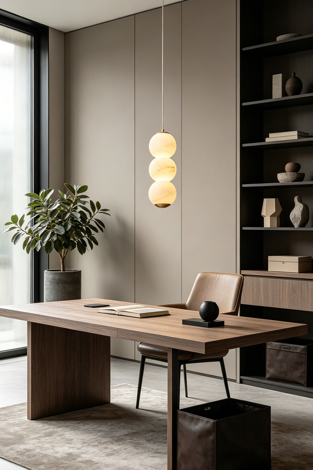 Imperial Epoch Alabaster Pendant Lamp | Metal, Alabaster | Single pendant illuminating a wooden workspace with a large green plant | Samu Lamp