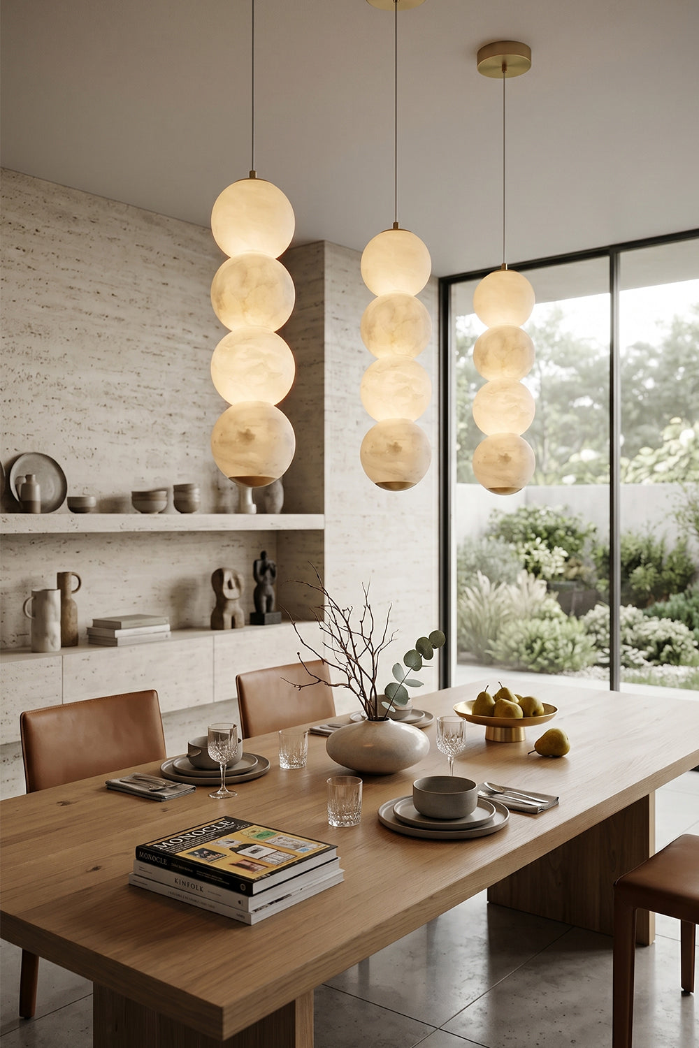 Imperial Epoch Alabaster Pendant Lamp | Metal, Alabaster | Three alabaster lamps hanging over a wooden dining table in a contemporary home | Samu Lamp