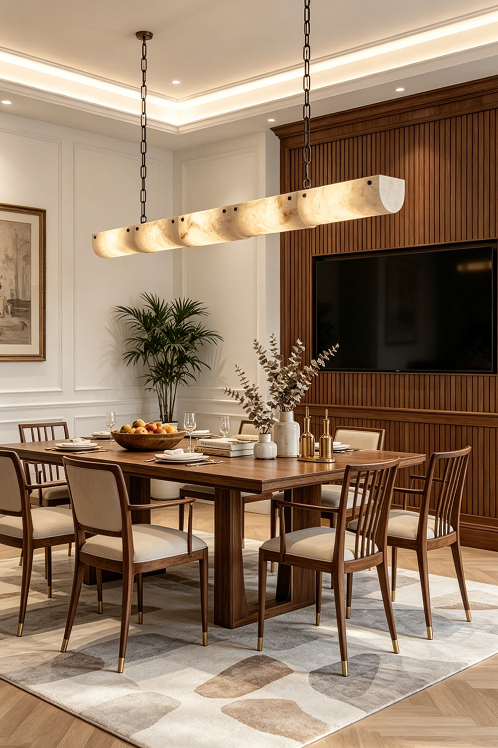Imperial Strata Alabaster Linear Pendant Lamp | Alabaster, Metal | Centered above a long wooden dining table in an elegant, modern dining space | Samu Lamp