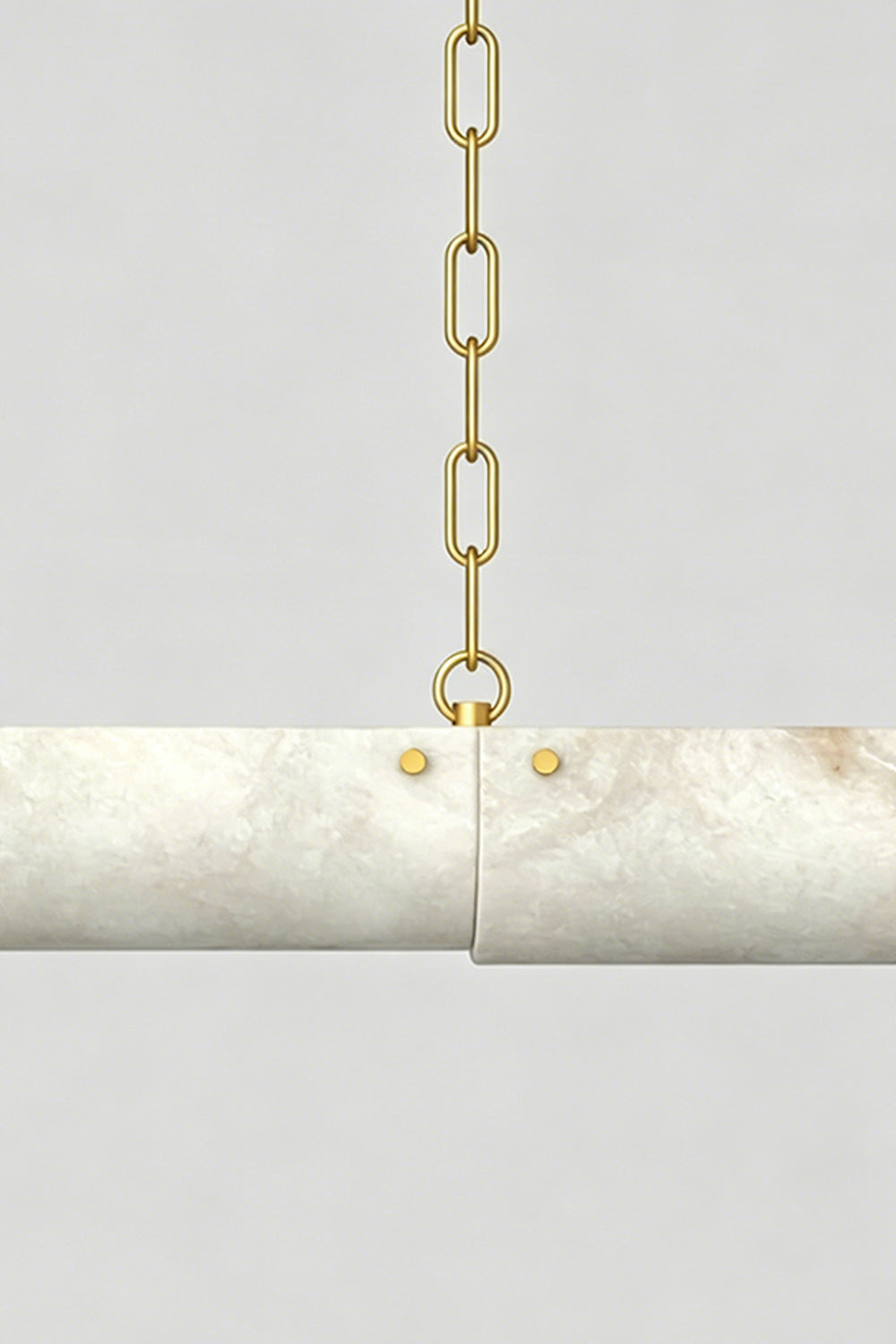 Imperial Strata Alabaster Linear Pendant Lamp | Alabaster, Metal | Close-up of the alabaster texture and gold metal suspension chain | Detail shot | Samu Lamp