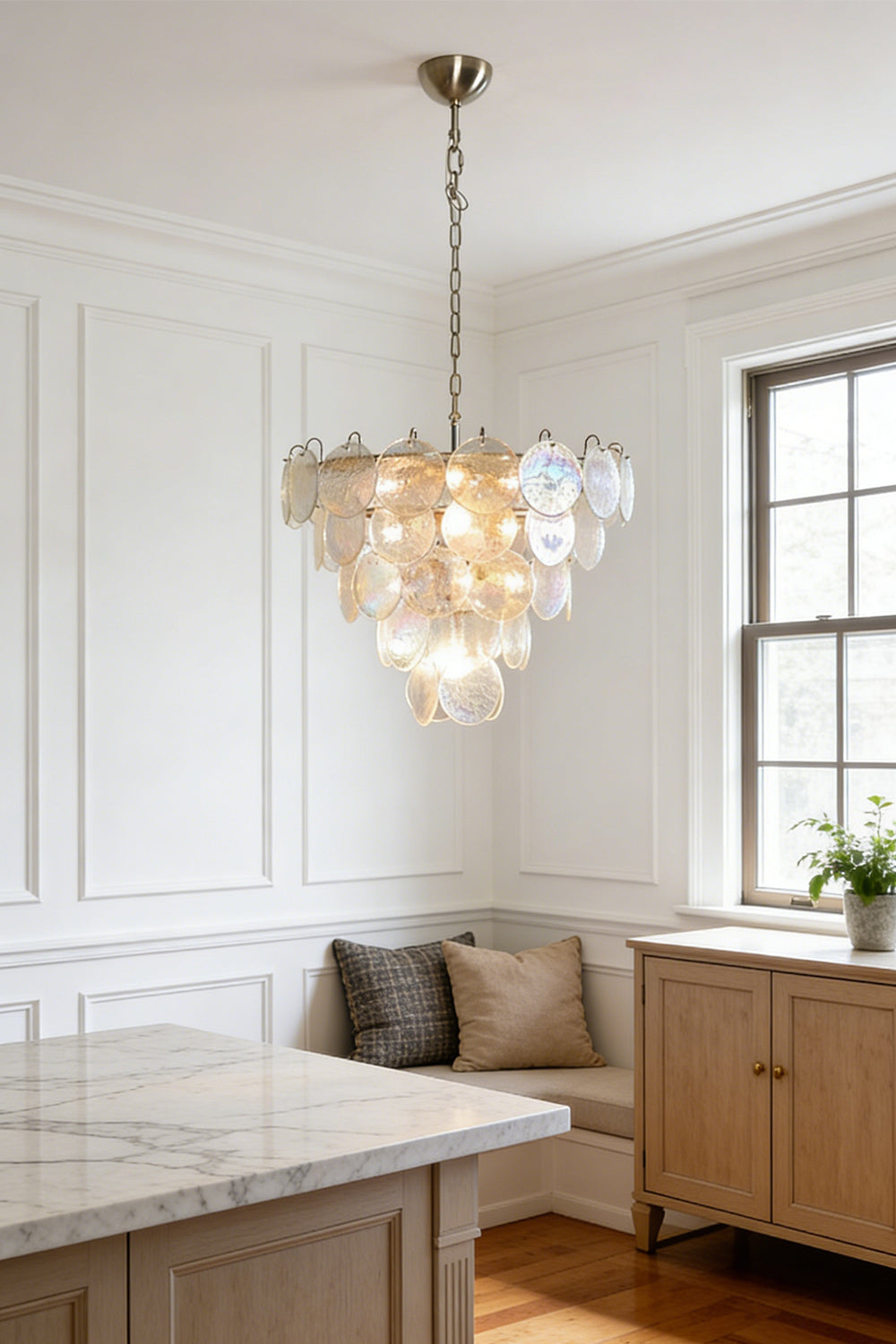 Shimmering glass disc chandelier | Metal, Glass | Hanging in a bright kitchen breakfast nook | Samu Lamp