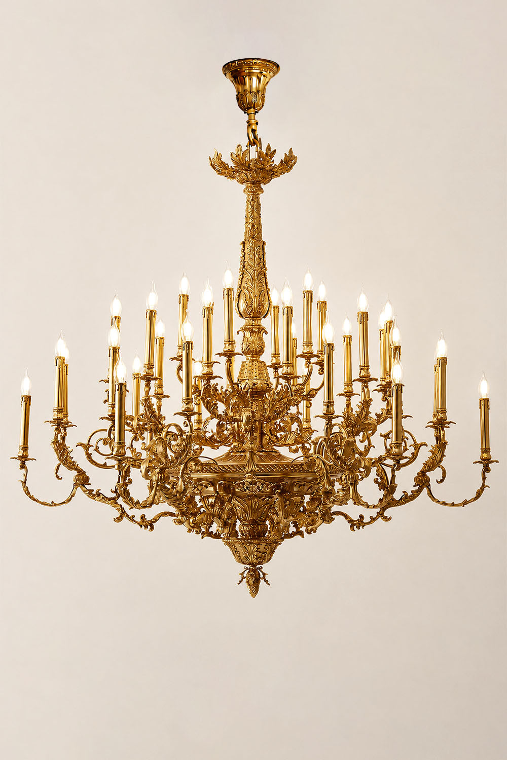 Percival Grand Brass Candelabra Chandelier featuring ornate design and multiple candle-style lights.