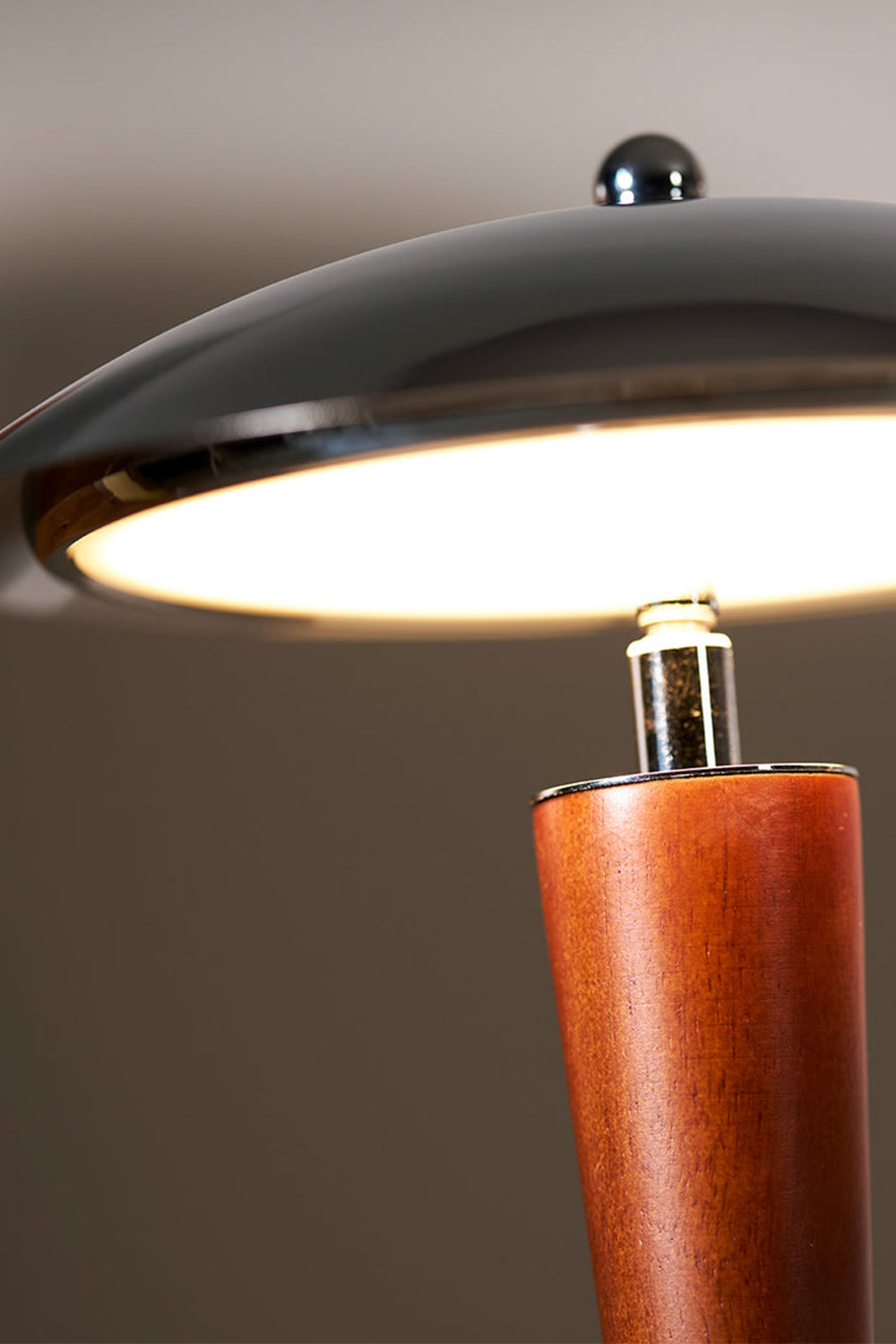 Isolde Domed Walnut Table Lamp | Underside Shade Detail | Close-up view from below looking under the chrome dome shade highlighting the integrated led panel and polished metallic texture | Detail shot | Samu Lamp