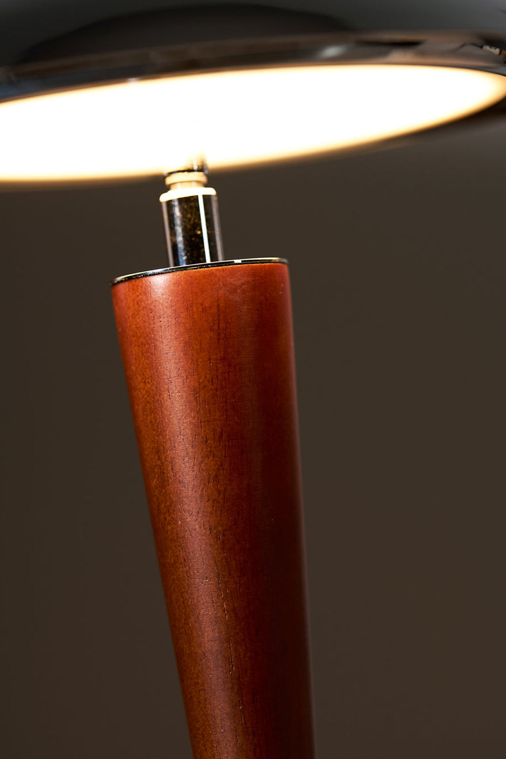 Isolde Domed Walnut Table Lamp | Walnut Stem Detail | Macro close-up shot focusing on the smooth organic grain of the tapered walnut wood body and the chrome neck connector | Detail shot | Samu Lamp