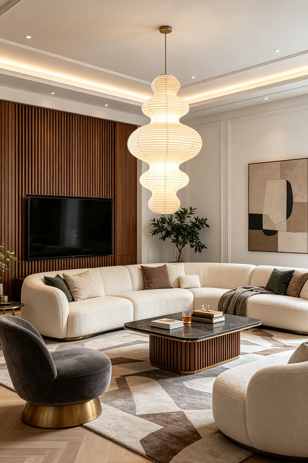 Isolde Stacked Paper Pendant Lamp | Textured Ribbed Paper | Adding a warm glow to a spacious modern living room with a large cream sofa and coffee table | Samu Lamp