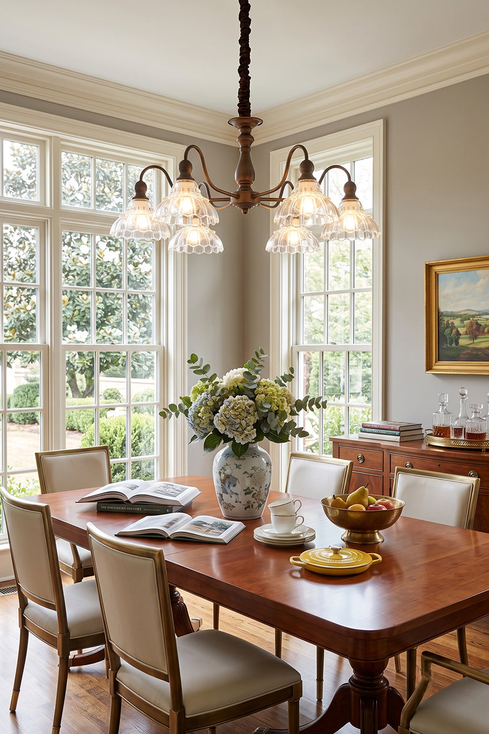 Isolde Vintage Scalloped Glass Chandelier | Dining Room Chandelier | Suspended beautifully above a long solid wood dining table paired with elegant neutral upholstered chairs | Samu Lamp
