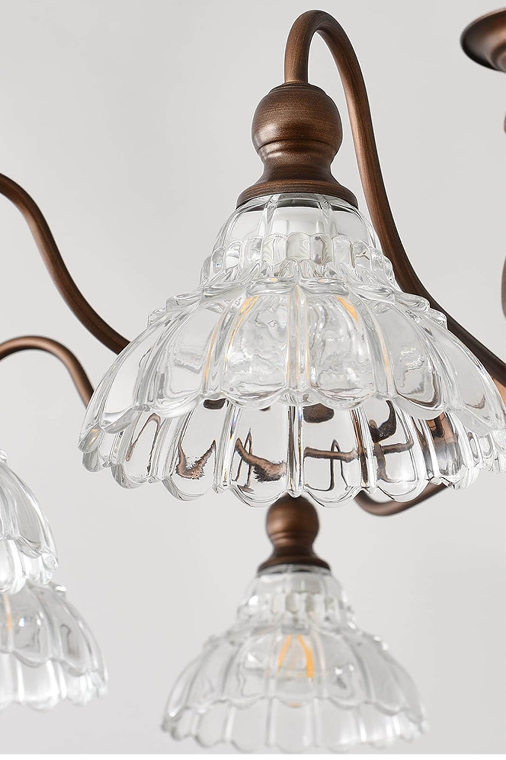 Isolde Vintage Scalloped Glass Chandelier | Clear Glass Detail | Studio presentation of the multi-light fixture highlighting the crisp transparency of the scalloped glass dome shades | Samu Lamp