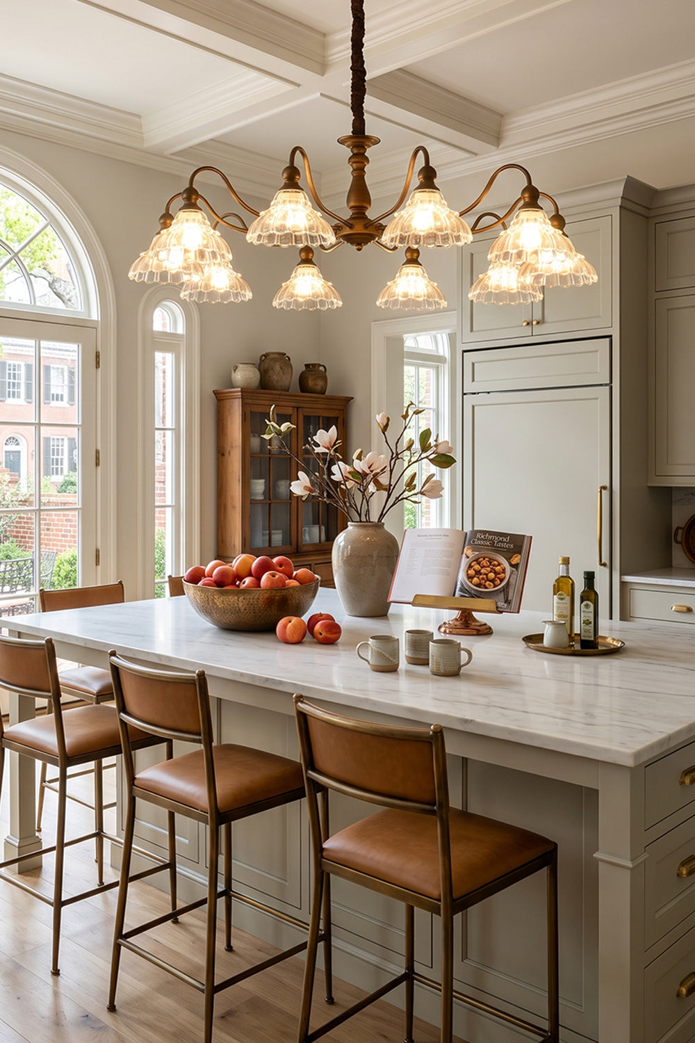 Isolde Vintage Scalloped Glass Chandelier | Kitchen Island Lighting | Hanging as a timeless centerpiece over a modern white kitchen island breakfast bar paired with leather counter stools | Samu Lamp