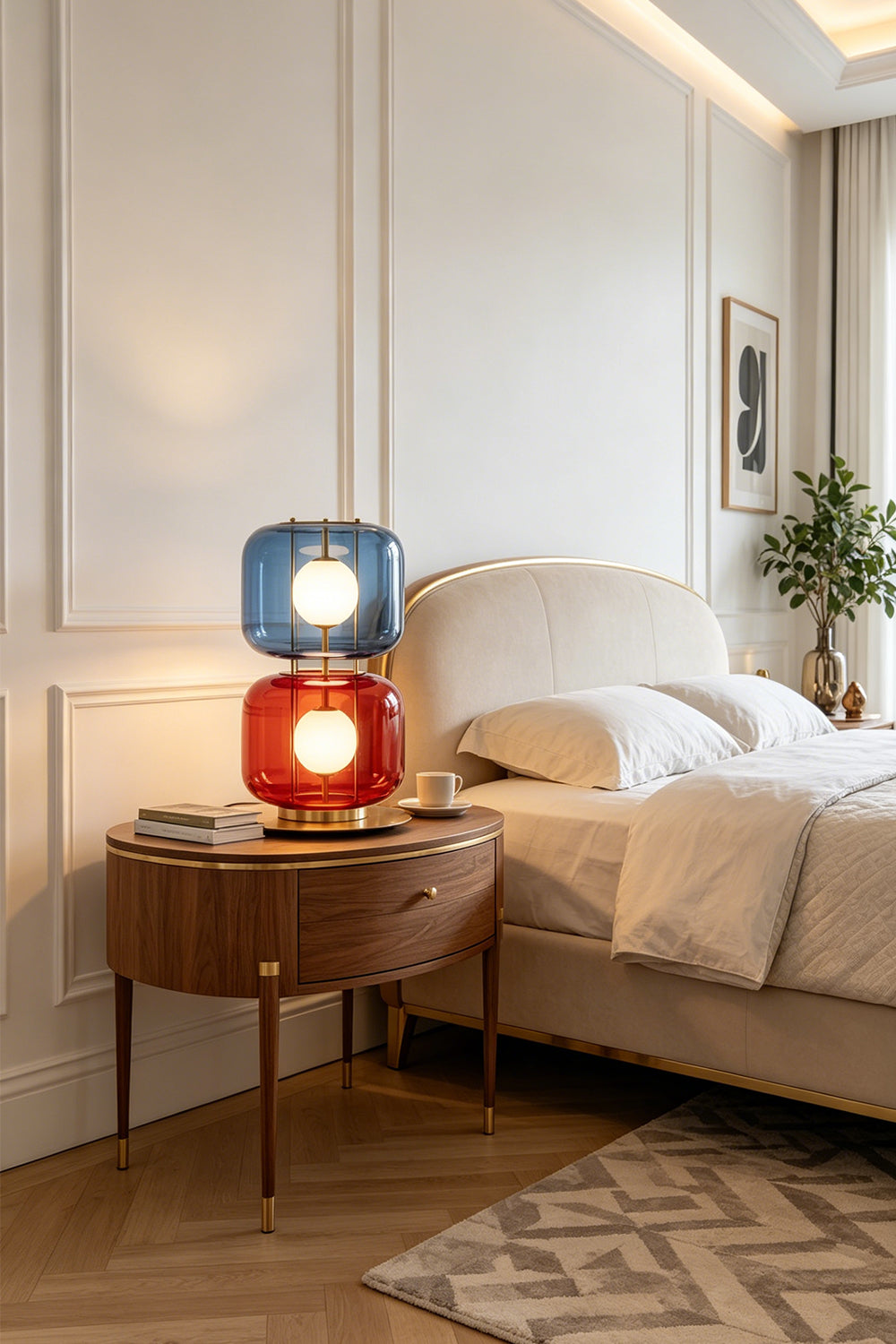 Jasper Colorblock Table Lamp | Glass, Metal | Set as an eye-catching bedside light on a wooden nightstand next to a cream platform bed in a serene modern bedroom | Samu Lamp