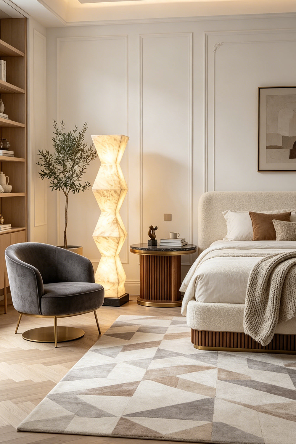 Kellan Geometric Alabaster Floor Lamp | Alabaster, Metal | Standing as luxurious ambient corner lighting in an elegant bedroom next to a plush bed and velvet accent chair | Samu Lamp