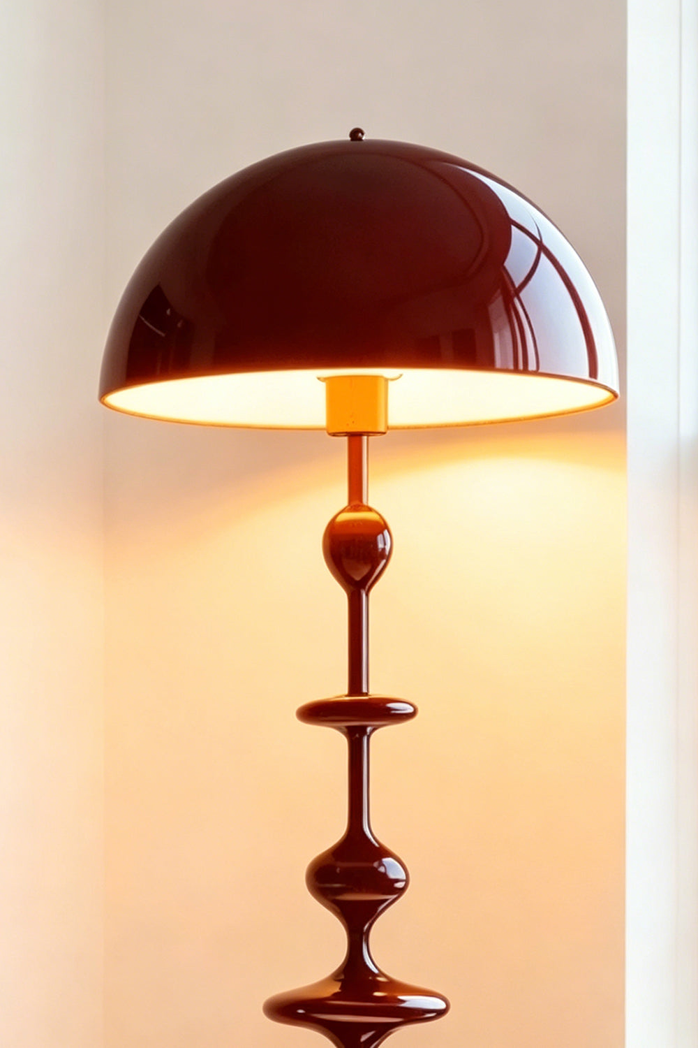 Kira Beaded Mushroom Floor Lamp | Metal, Glossy Finish | Close-up view of the illuminated burgundy red variant, highlighting the warm light glowing beneath the glossy shade | Samu Lamp