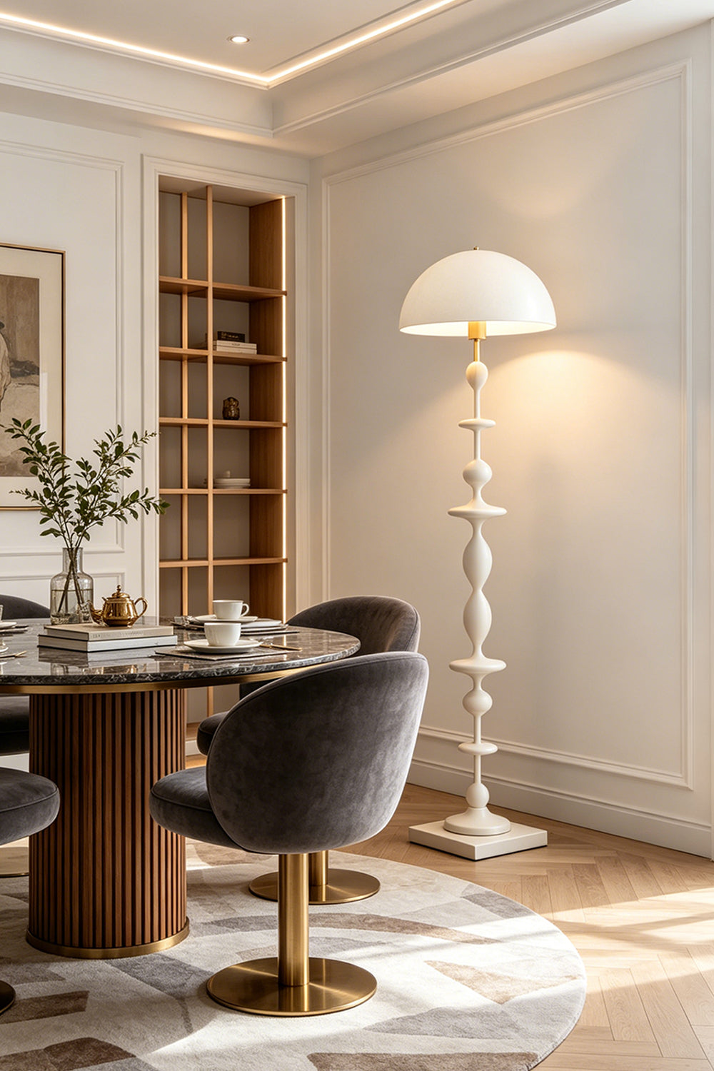 Kira Beaded Mushroom Floor Lamp | Metal, Glossy Finish | The white variant styled elegantly in a dining room corner next to a round wooden table and plush grey chairs | Samu Lamp