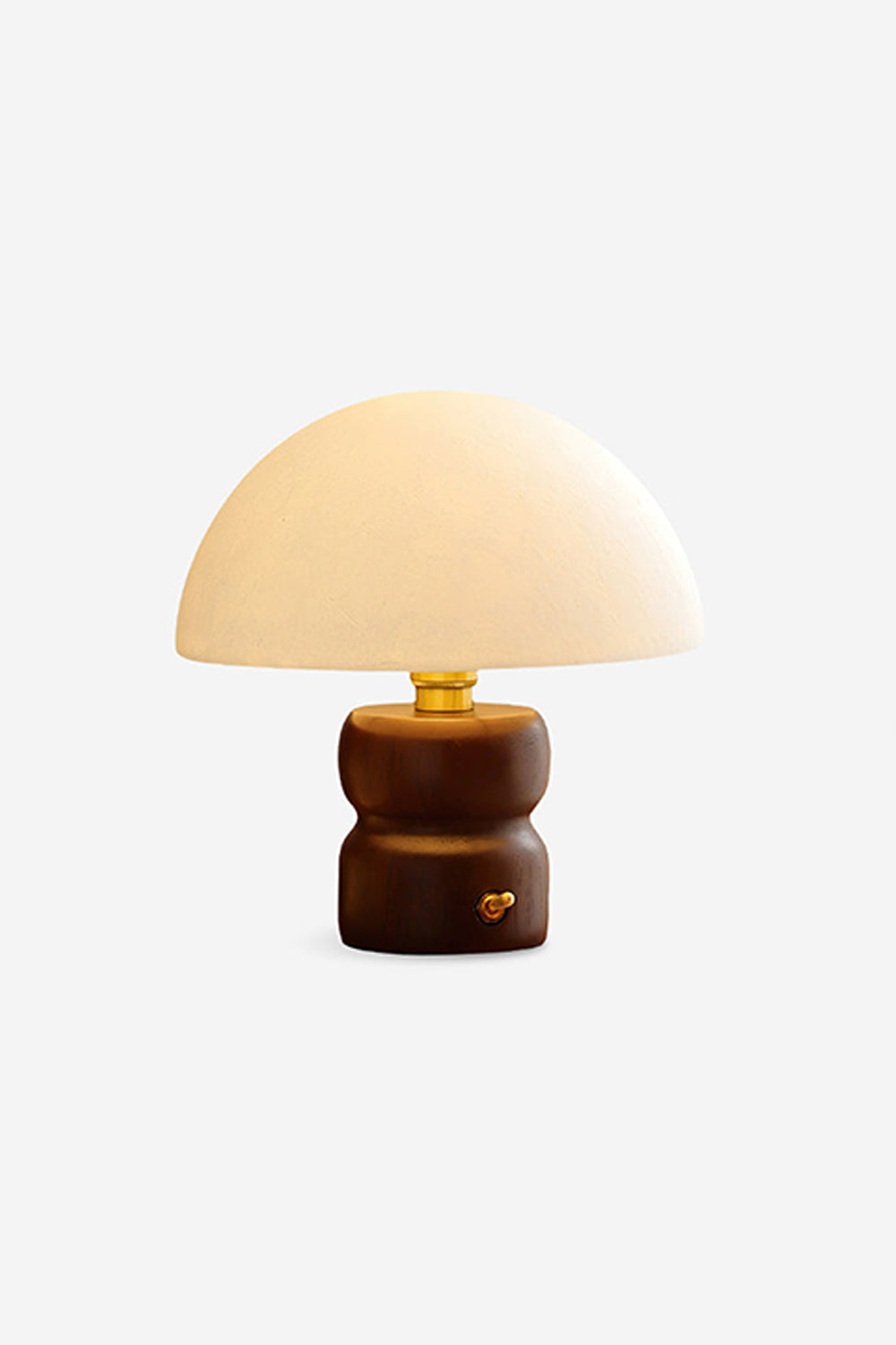 Kira Sculpted Mushroom Table Lamp | Wood, Glass | Isolated front product view of the dark wood variant fully lit and radiating soft light against a white background | Samu Lamp