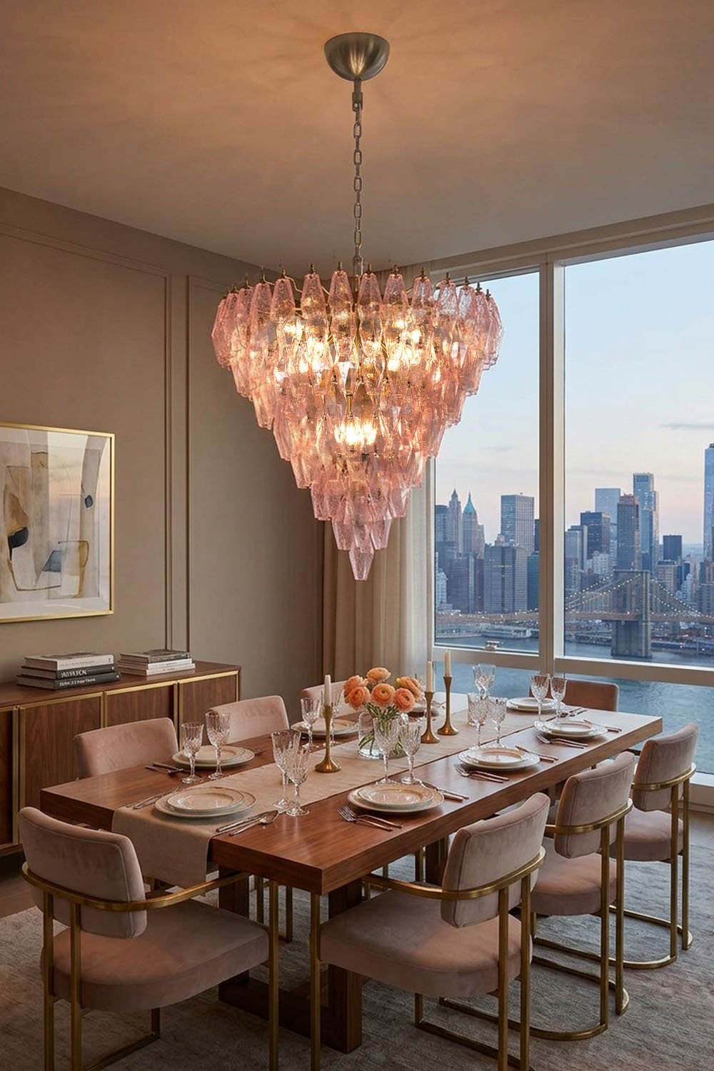 Lauragne Pink Faceted Glass Cascade Chandelier | Pink Faceted Glass and Brass | Illuminating a dining area over a table with chairs facing city skyline | Samu Lamp