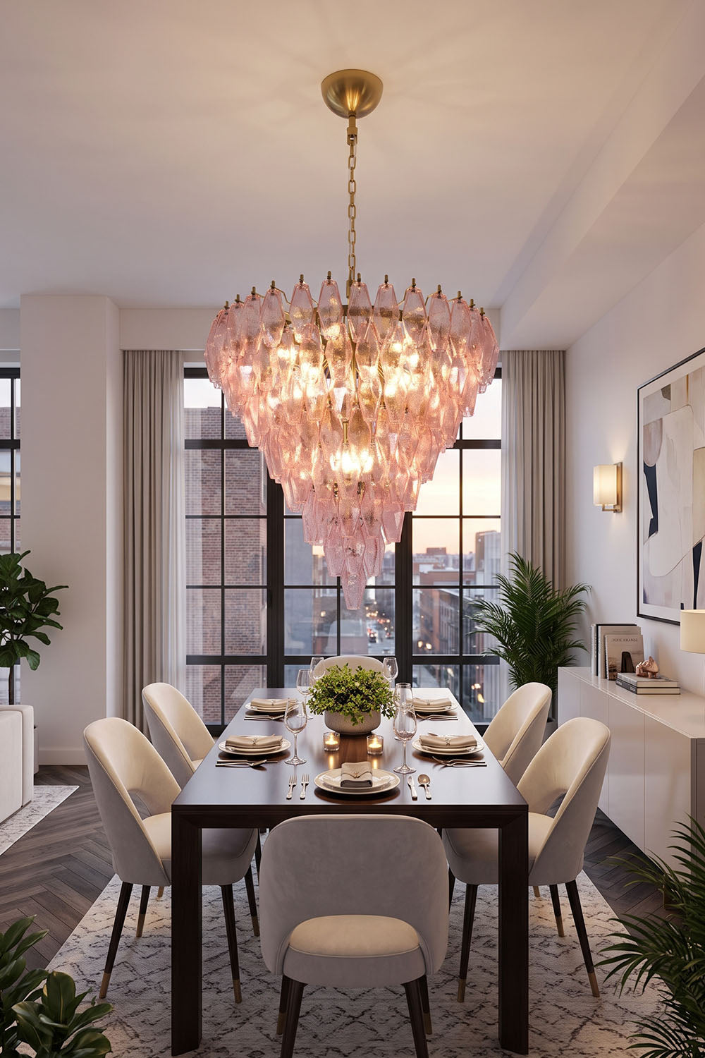 Lauragne Pink Faceted Glass Cascade Chandelier | Pink Faceted Glass and Brass | Suspended in a dining room over a long table near city view windows | Samu Lamp