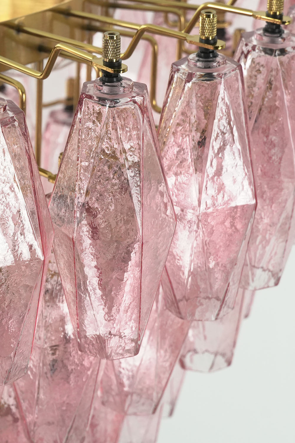 Lauragne Pink Faceted Glass Cascade Chandelier | Pink Faceted Glass and Brass | Detail shot showing cascading layers of pink glass prism pendants | Samu Lamp
