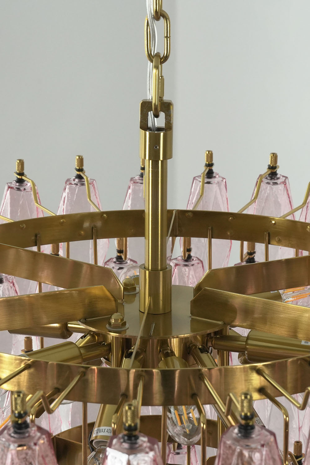 Lauragne Pink Faceted Glass Cascade Chandelier | Pink Faceted Glass and Brass | Bottom-up perspective showing internal circular brass tiers and structure | Samu Lamp