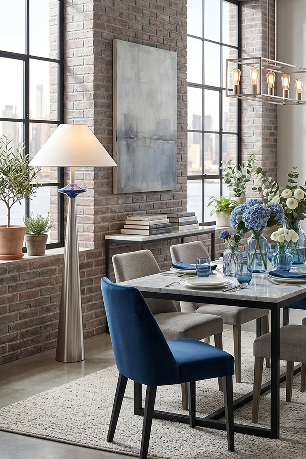 Lazuro Postmodern Cone Floor Light | Metal, Fabric | Illuminating a modern classical loft dining area, casting a warm ambient glow near a dining table setup with dark blue chairs | Samu Lamp