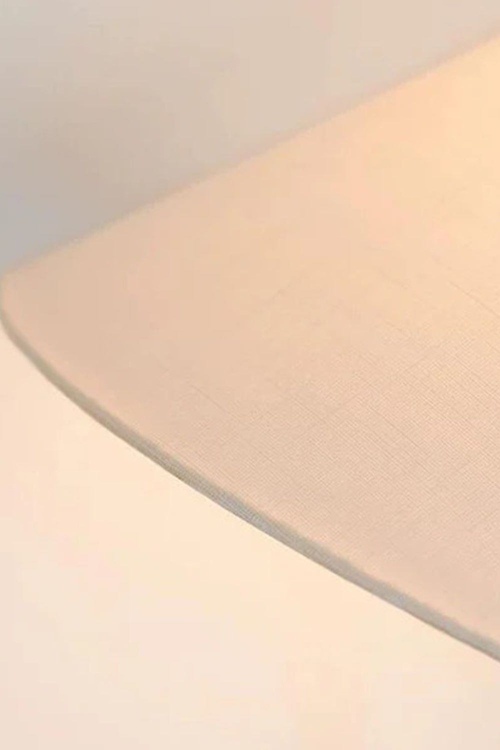 Lazuro Postmodern Cone Floor Light | Metal, Fabric | Detailed view from underneath the white linen cone lampshade showcasing the warm diffused glow and textured fabric weave | Detail shot | Samu Lamp