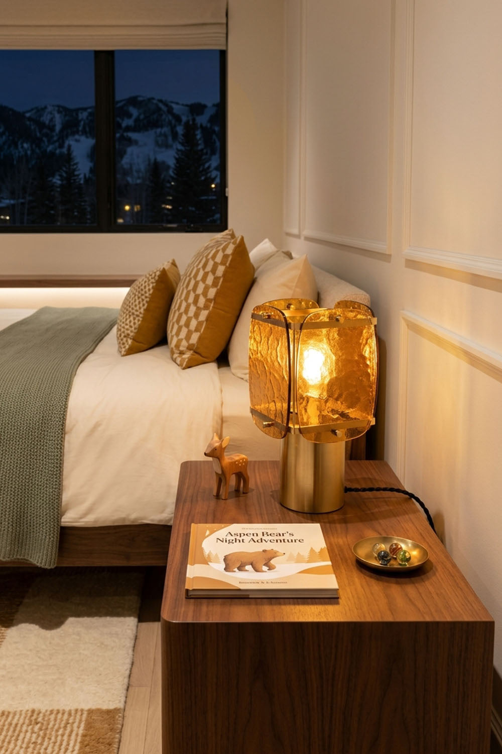 Lesquin Hammered Amber Glass Table Lamp | Hammered Amber Glass and Brass | Lighting a wooden bedside nightstand in a cozy bedroom setting | Samu Lamp