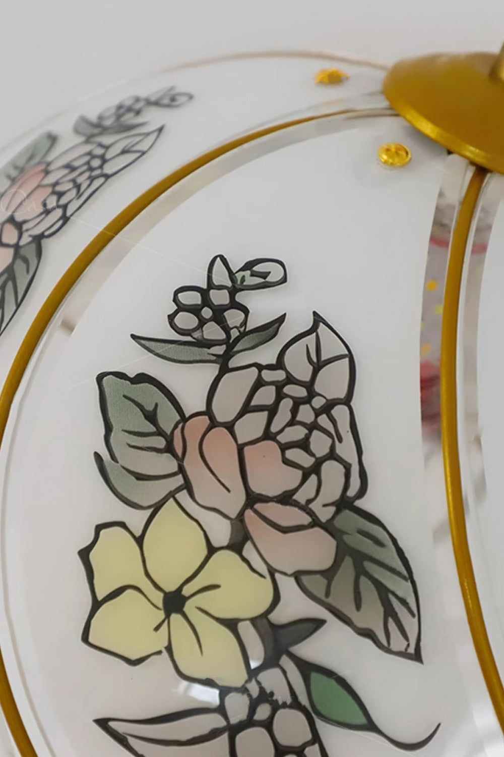 Lillian Retro Floral Wall Lamp | Glass, Metal | Detailed close-up view of the unlit white glass shade displaying elegant painted rose and floral motifs | Detail shot | Samu Lamp