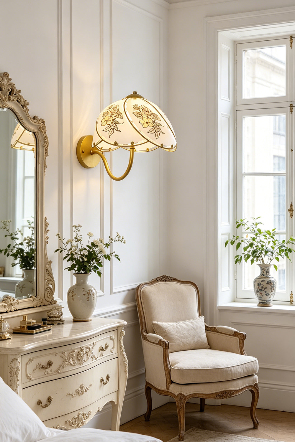 Lillian Retro Floral Wall Lamp | Glass, Metal | Installed next to a classic mirrored vanity table and a French-style armchair in a bright room | Samu Lamp