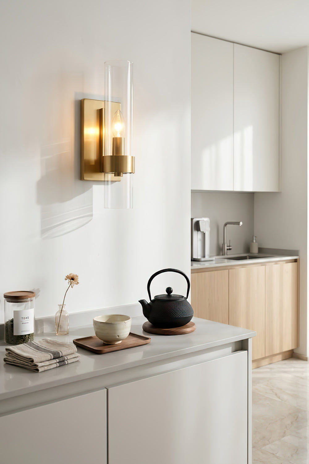 Modern linear brass wall light | Brass, Glass | Installed in a white kitchen setting | Samu Lamp