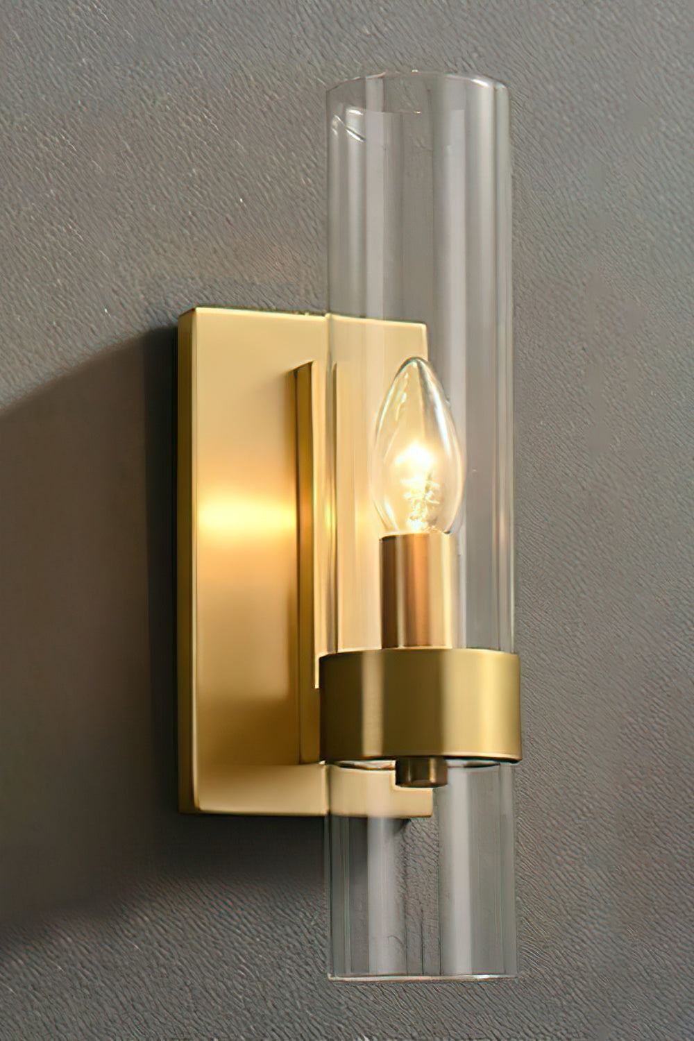 Linear metallic brass wall sconce | Brass, Glass | Angled product view on grey background | Samu Lamp