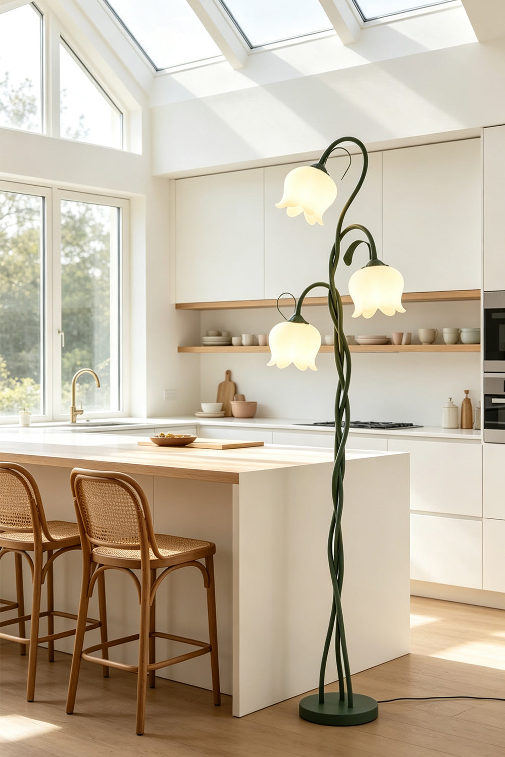 Linnea Tulip Bloom Floor Lamp | Glass and Green Metal | Displayed next to a modern kitchen island with wooden bar stools | Samu Lamp