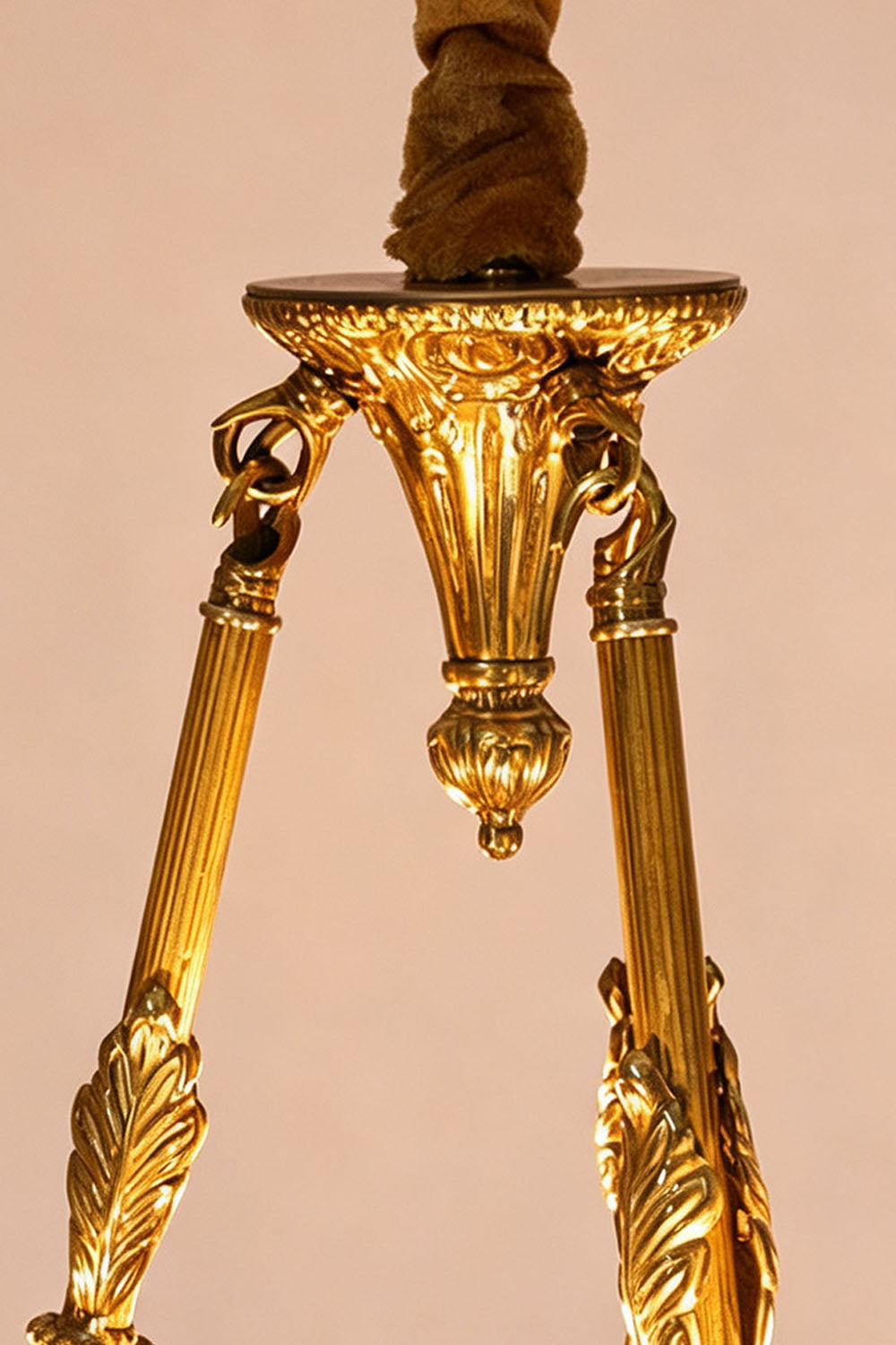 Lucienne Fluted Glass Urn Brass Chandelier showcasing intricate gold detailing and ornate design.