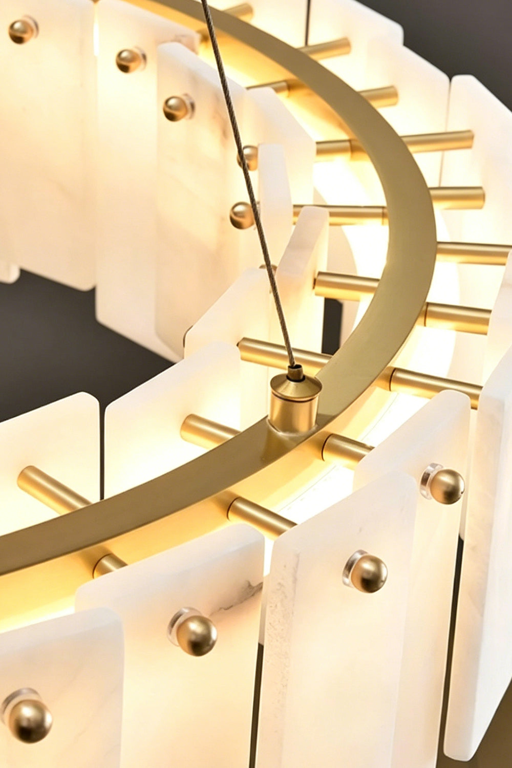 Chandelier Detail | Alabaster, Brass | Top view of circular brass frame and wires | Samu Lamp