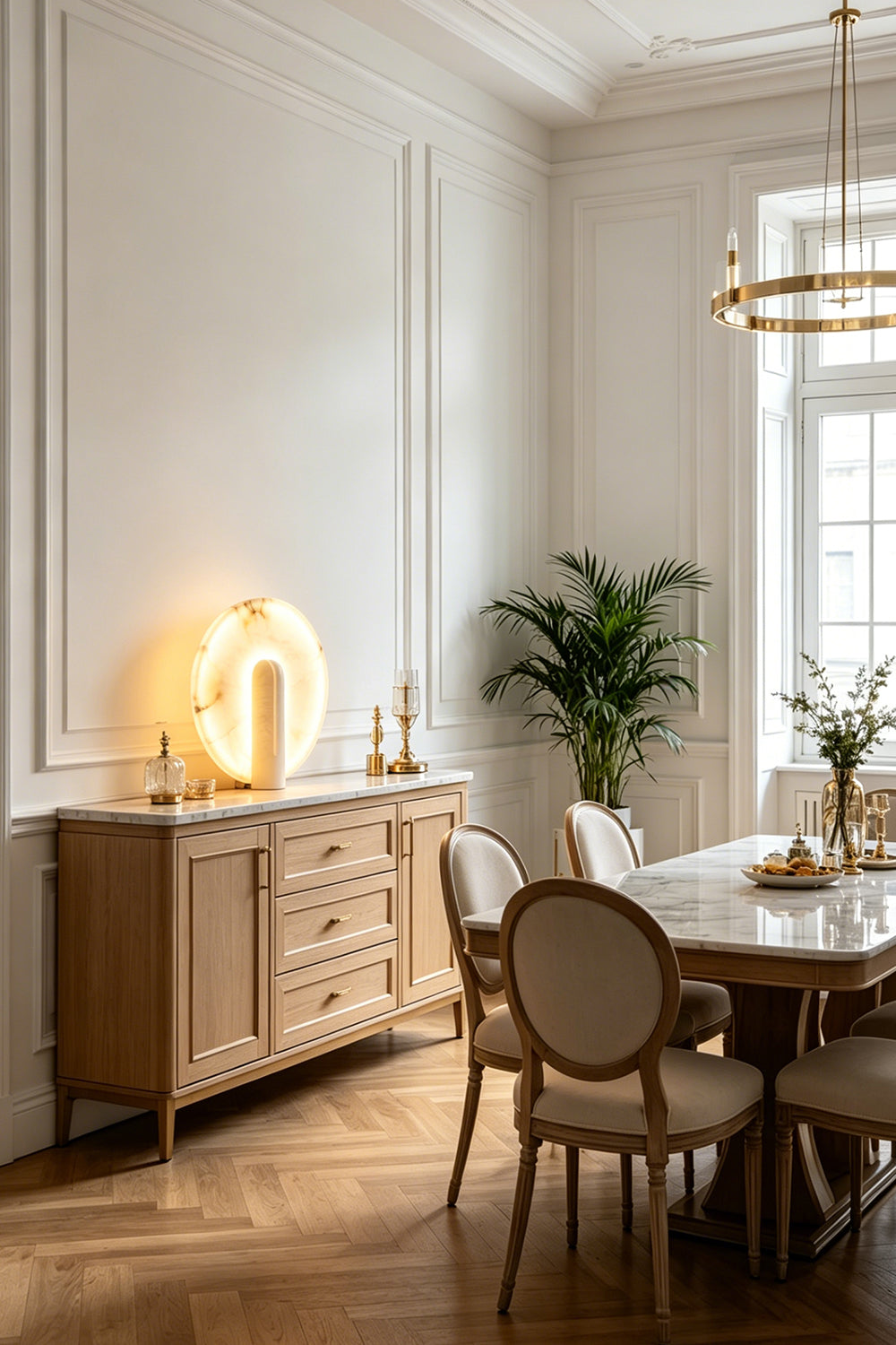 Lunar Horizon Alabaster Table Lamp | Alabaster | Placed on wooden sideboard in elegant dining room | Samu Lamp