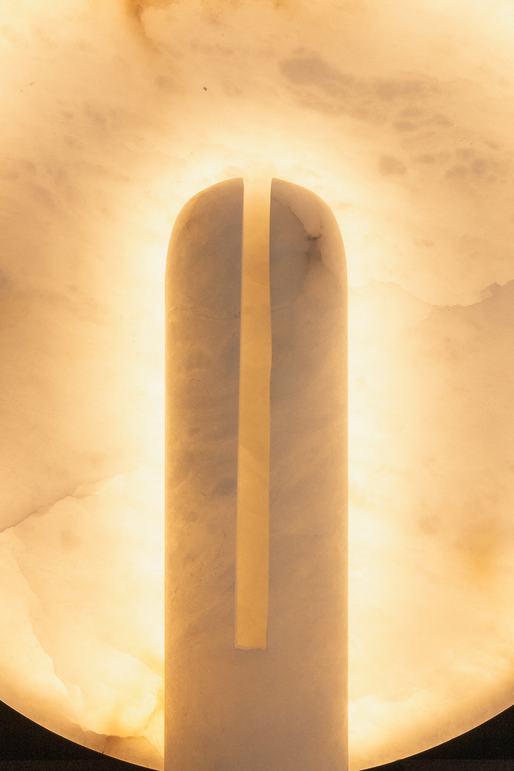 Lunar Horizon Alabaster Table Lamp detail | Alabaster | Close-up of lit stone texture and central bar | Samu Lamp