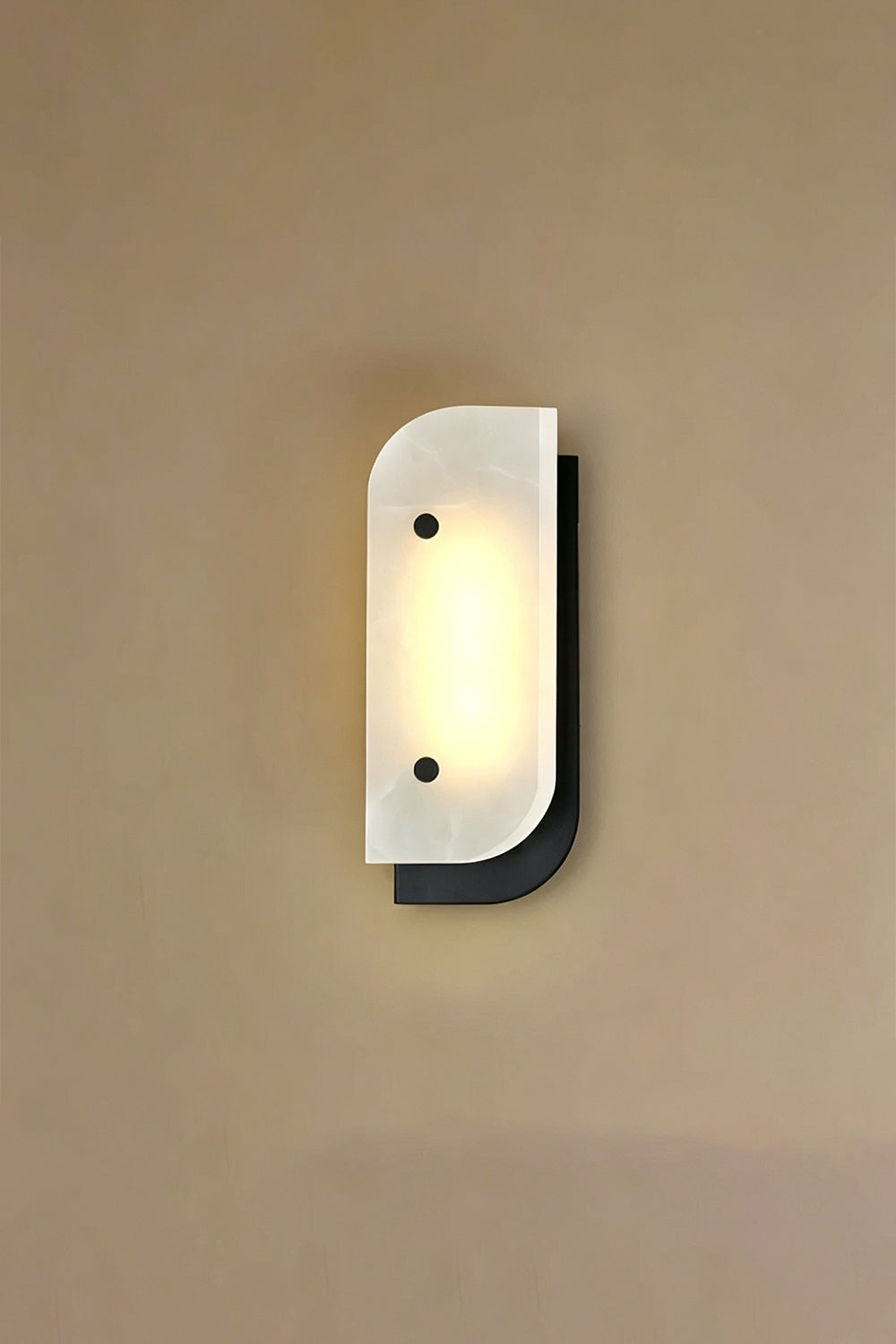 Unilluminated alabaster wall light | Alabaster, Metal | Unlit product shot against textured wall | Samu Lamp