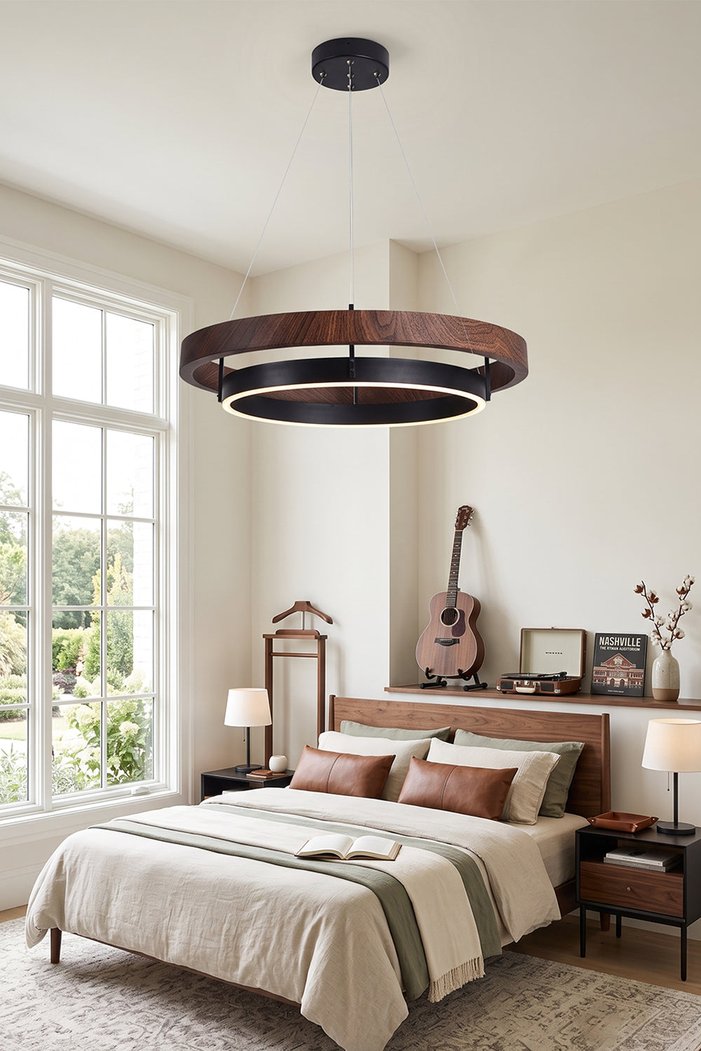 Lysander Dual-Ring LED Chandelier illuminating a stylish bedroom with modern decor and warm lighting.