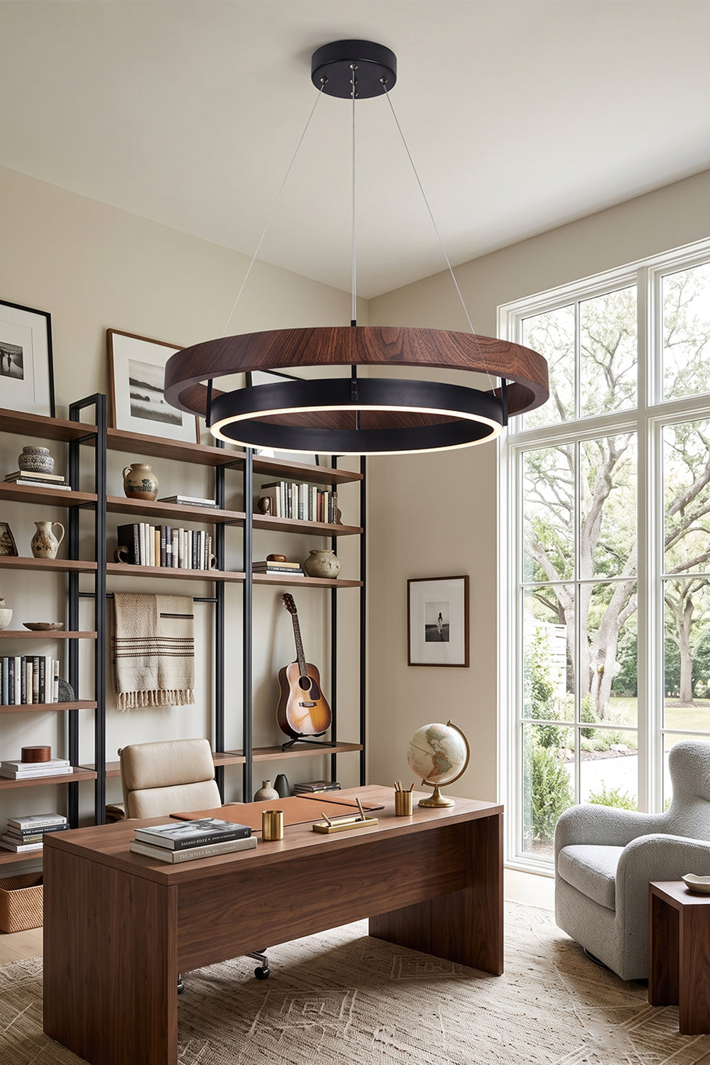 Lysander Dual-Ring LED Chandelier in a modern office setting with warm walnut finish, illuminating a stylish workspace.