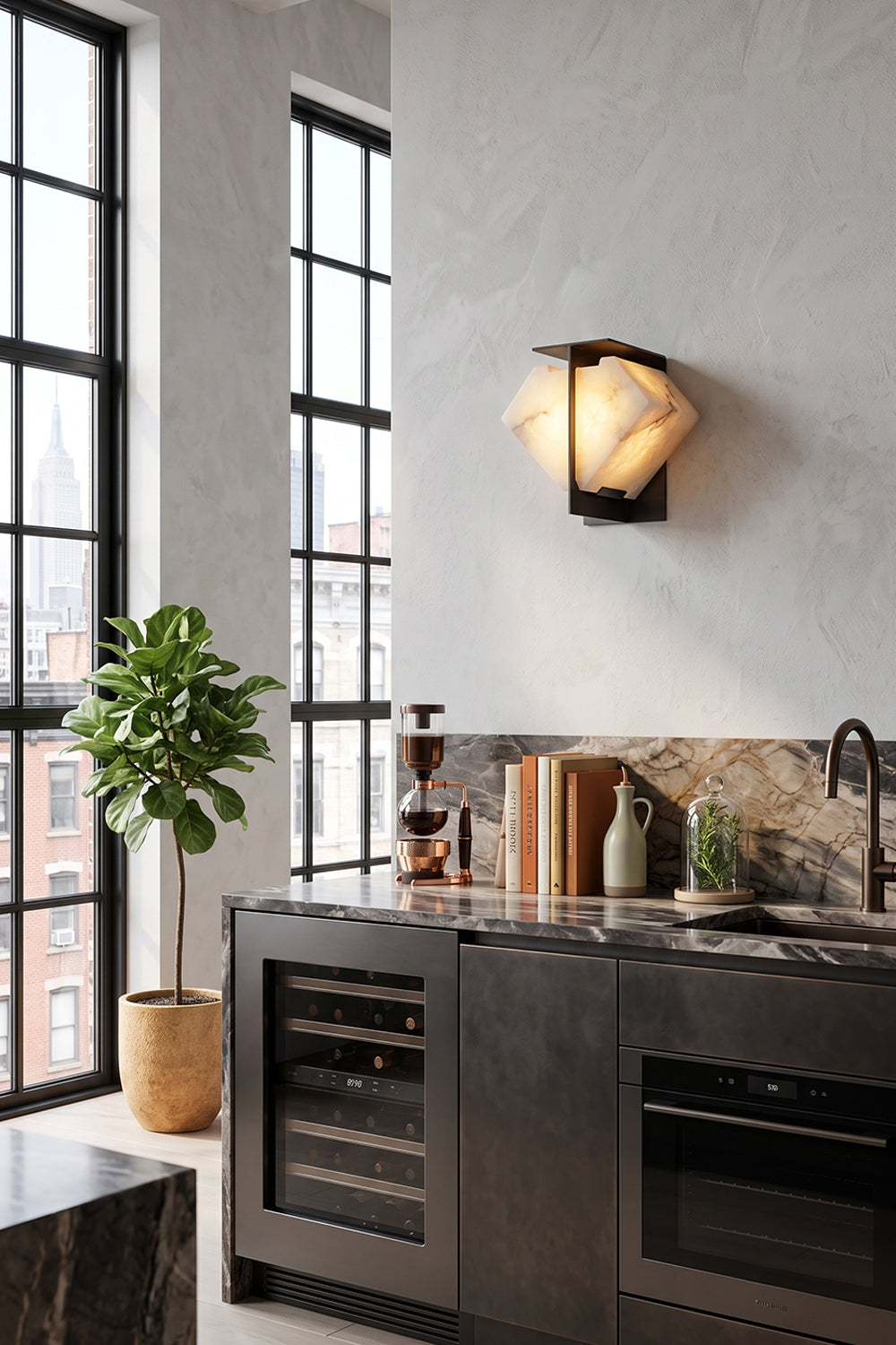 Lysandra Alabaster Folded Halo Wall Lamp | Bar Wall Sconce | Providing a soft ambient glow on a contemporary kitchen bar wall next to dark industrial cabinetry and a wine cooler | Samu Lamp