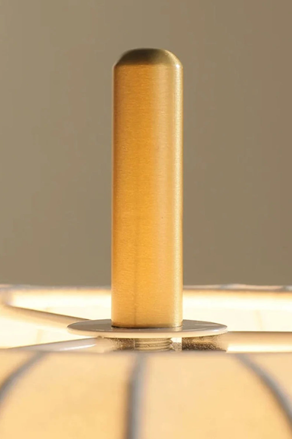 Maren Woven Silk Gourd Table Lamp | Woven Silk, Brass and Wood | Close-up view of the top cylindrical brass finial detail | Samu Lamp