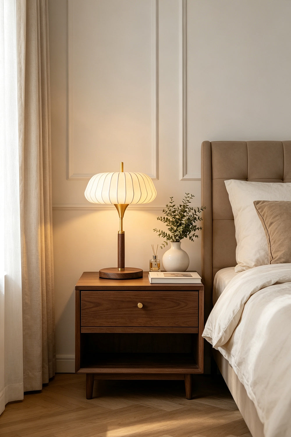Maren Woven Silk Gourd Table Lamp | Woven Silk, Brass and Wood | Illuminating a bedside nightstand in a warm bedroom | Samu Lamp
