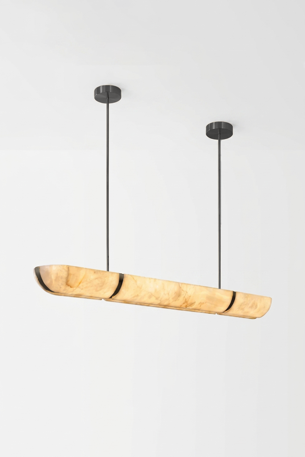 Marlen Alabaster Bar Linear Pendant Light with elegant design and gold accents suspended from black cables.
