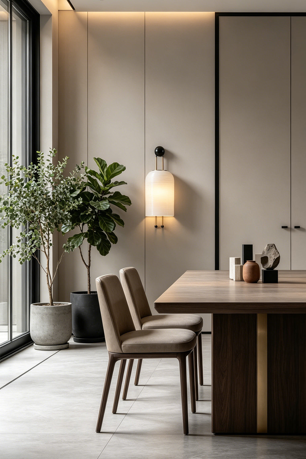 Marlow Linear Ribbed Glass Wall Lamp | Glass, Metal | Providing a warm ambient glow in a contemporary dining room next to a long wooden table and sleek chairs | Samu Lamp