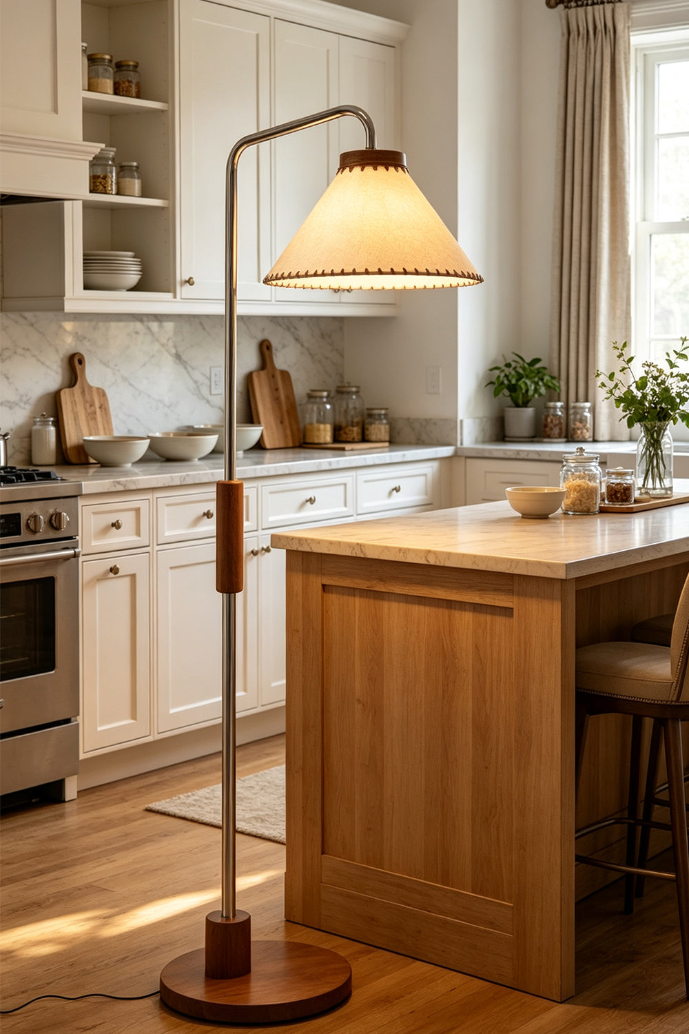 Marlowe Angled Linen Reading Floor Lamp | Linen, Wood, and Chrome Metal | Positioned in a modern kitchen area next to a large wooden island counter and white cabinets | Samu Lamp