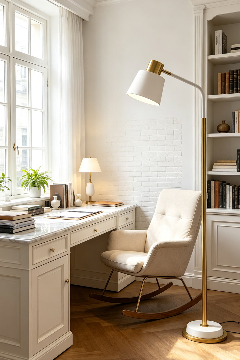 Marlowe Gooseneck Reading Floor Lamp | Matte White and Gold | Standing beside a white armchair in a cozy home library workspace | Samu Lamp