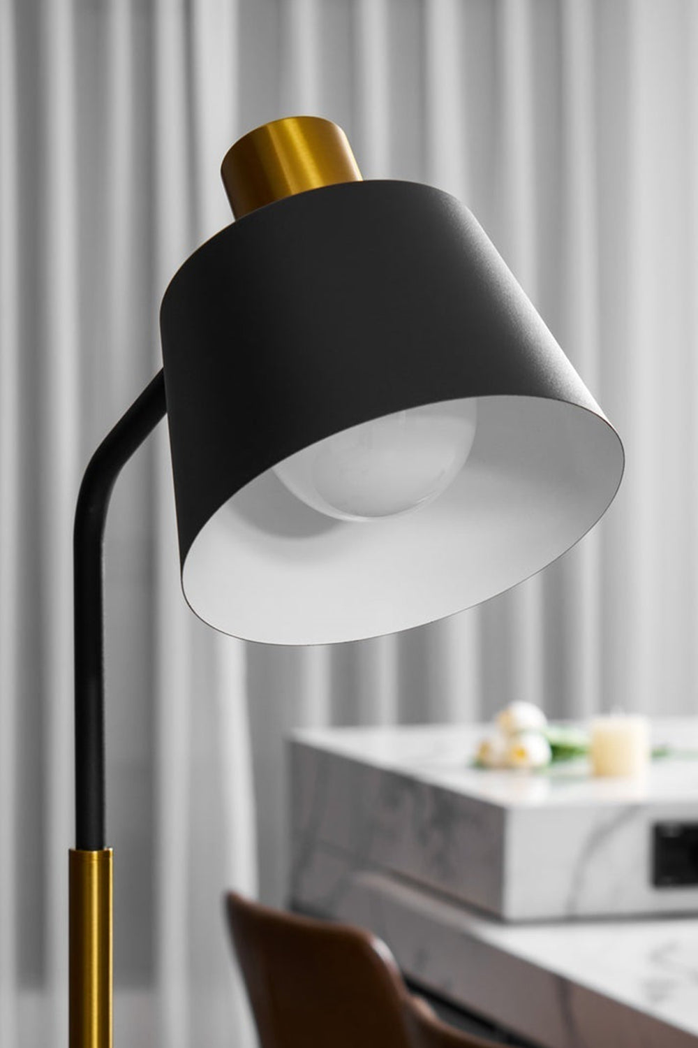 Marlowe Gooseneck Reading Floor Lamp | Matte Black and Brass | Close-up view of the black metal shade with white inner reflector and brass top | Samu Lamp