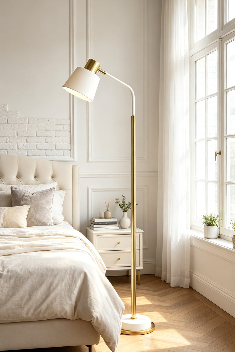 Marlowe Gooseneck Reading Floor Lamp | Matte White and Gold | Placed next to a bed with light linens in a sunny modern bedroom | Samu Lamp